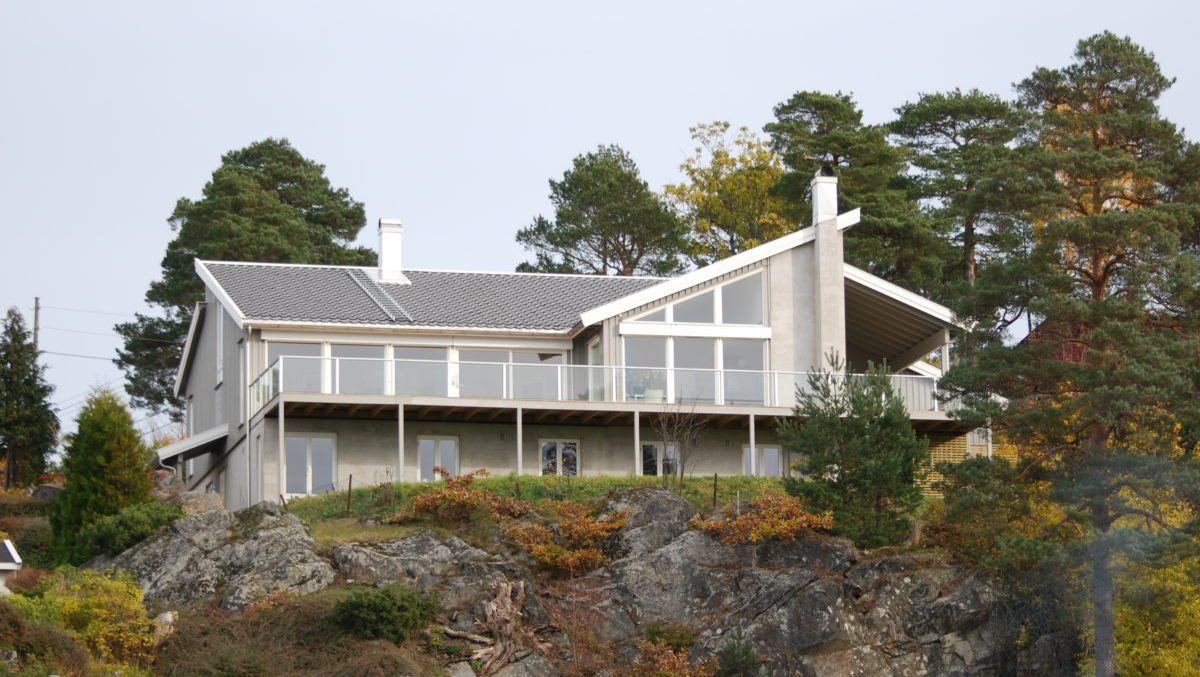 Moderne grå bolig med pulttak